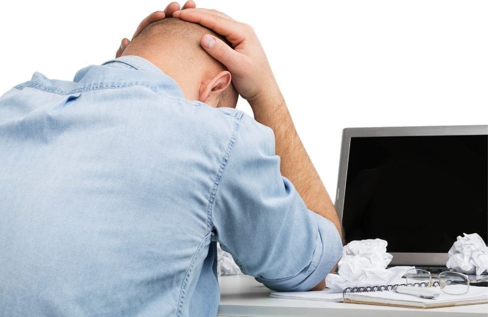 An image of a frustrated blogger.