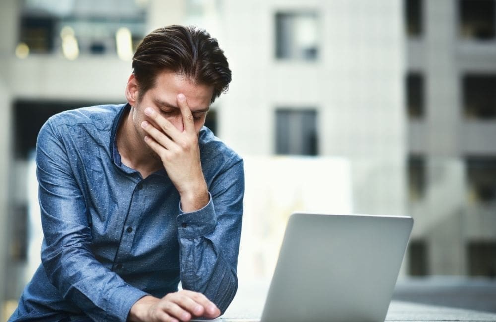 An image of a frustrated blogger.