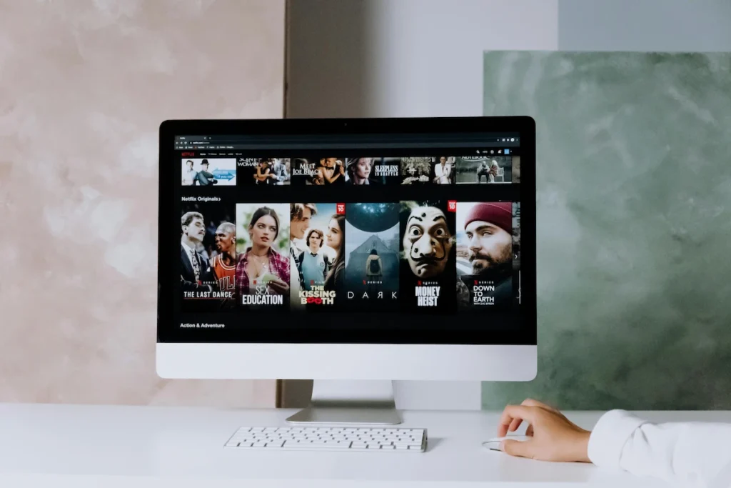 Computer screen displaying a list of movie or TV show choices on a streaming platform.