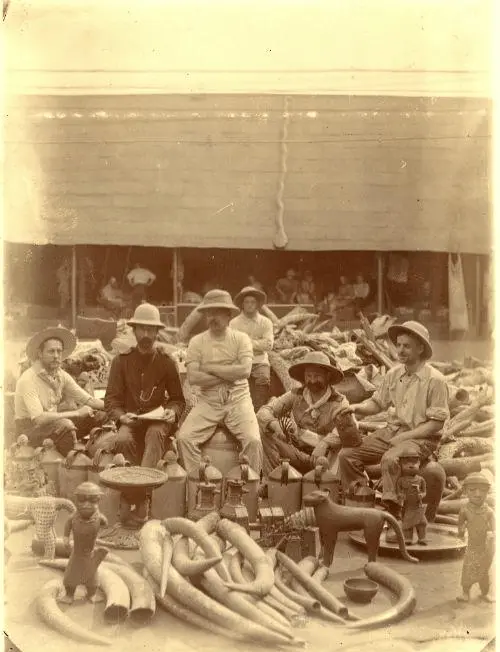 British soldiers sit in a palace compound in Benin City surrounded by objects looted during the 1897 military expedition, in a photograph taken by the expedition’s Principal Medical Officer, Dr. Robert Allman. Photo: British Museum