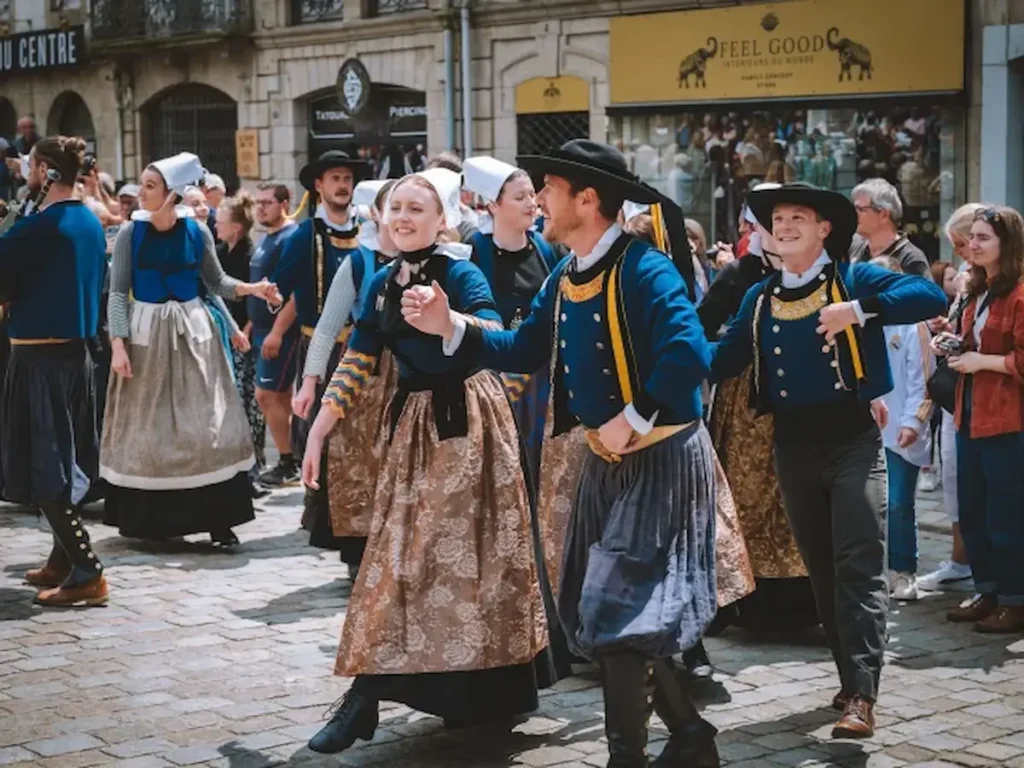 Breton people wearing traditional clothing at a cultural festival in Brittany, France.