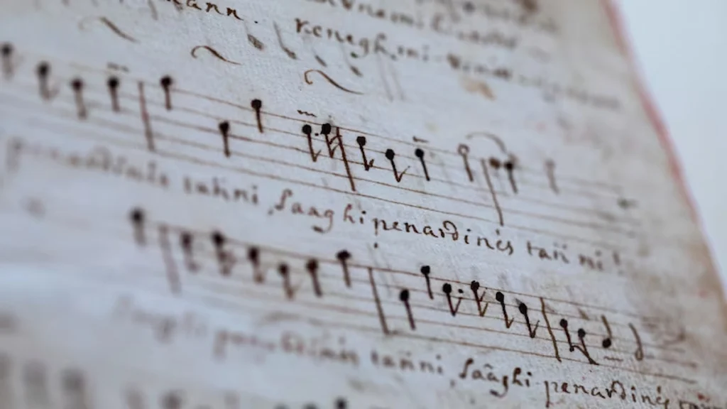 Abenaki language script displayed on a cultural manuscript.