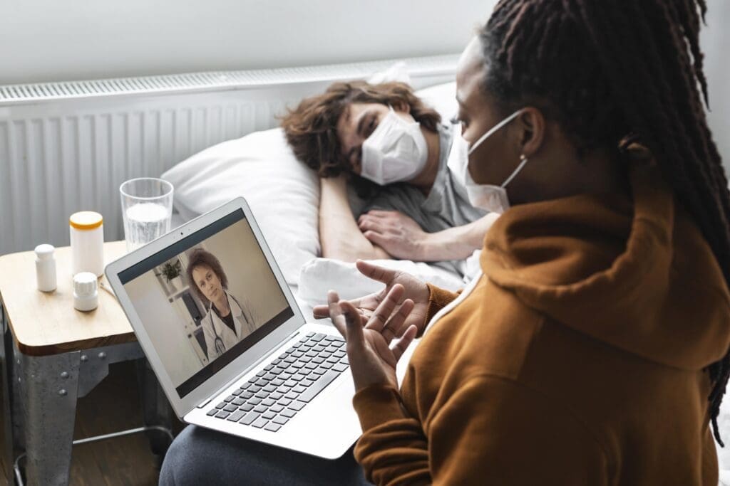 A girl discussing with a health care professional through teletherapy