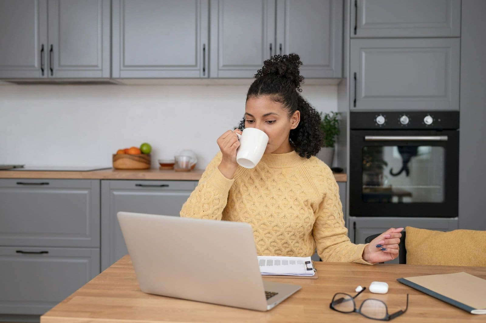 freelancer working during set office hours in home workspace freelancer working during set office hours in home workspace